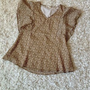 Boutique blouse. Tan and off-white. Worn once and dry cleaned. Size small.